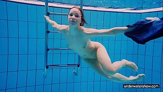 Teen cookie Avenna is swimming in the pool